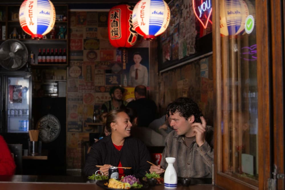 people are eating sushi